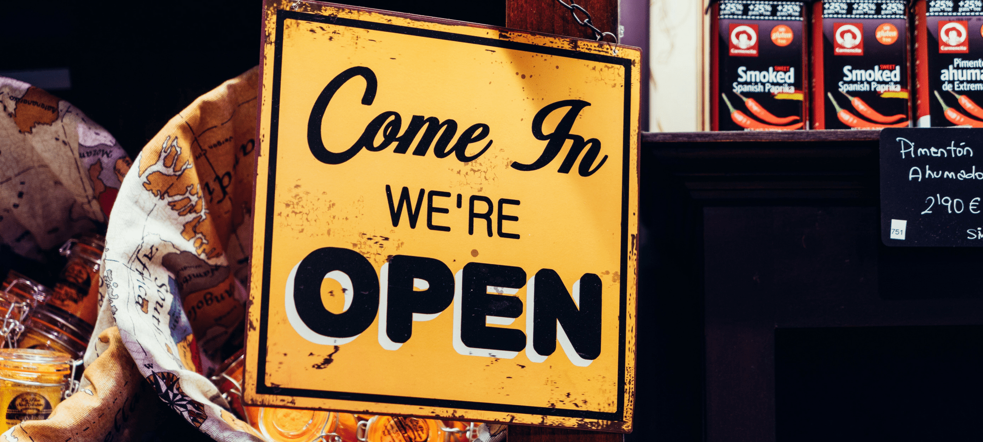 We're open, yellow shop sign